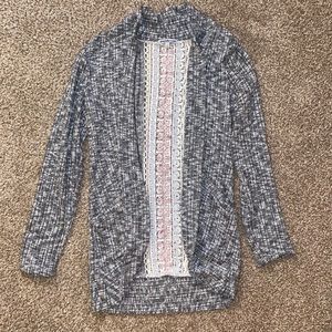 Throw cardigan. Heater gray knit, and knit detailing in back. Charlotte Russe.